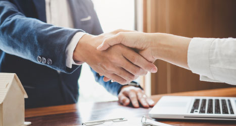 two people shaking hands