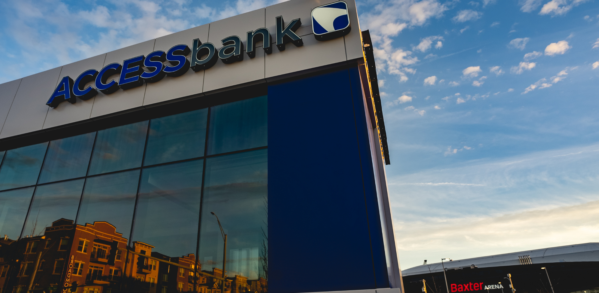 ACCESSbank written on a building outside of Baxter Arena.
