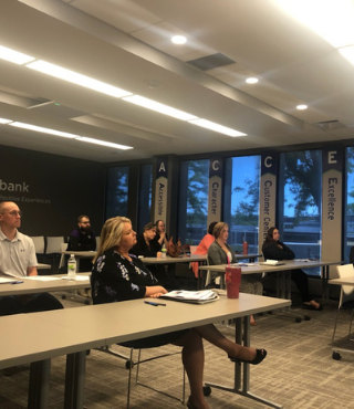 Photo of employees attending a diversity, equity, and inclusion workshop.