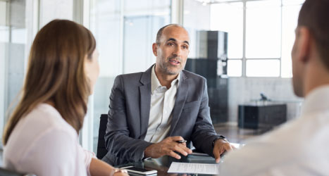 a group of business people having a meeting