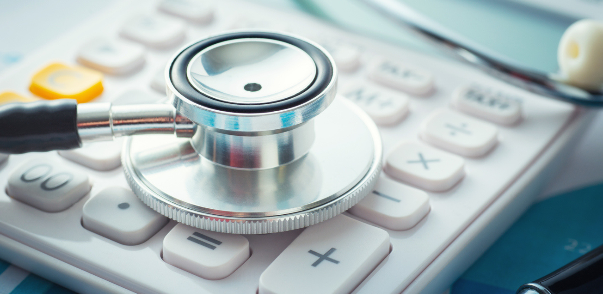 A stethoscope on top of a keyboard.